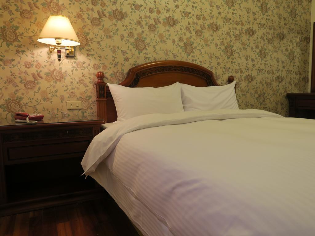Champagne Hotel Jiaoxi Værelse billede
